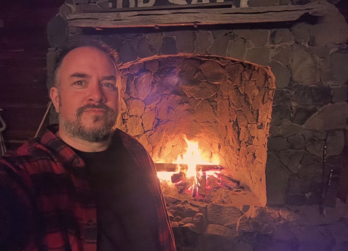 Adam by the fireside